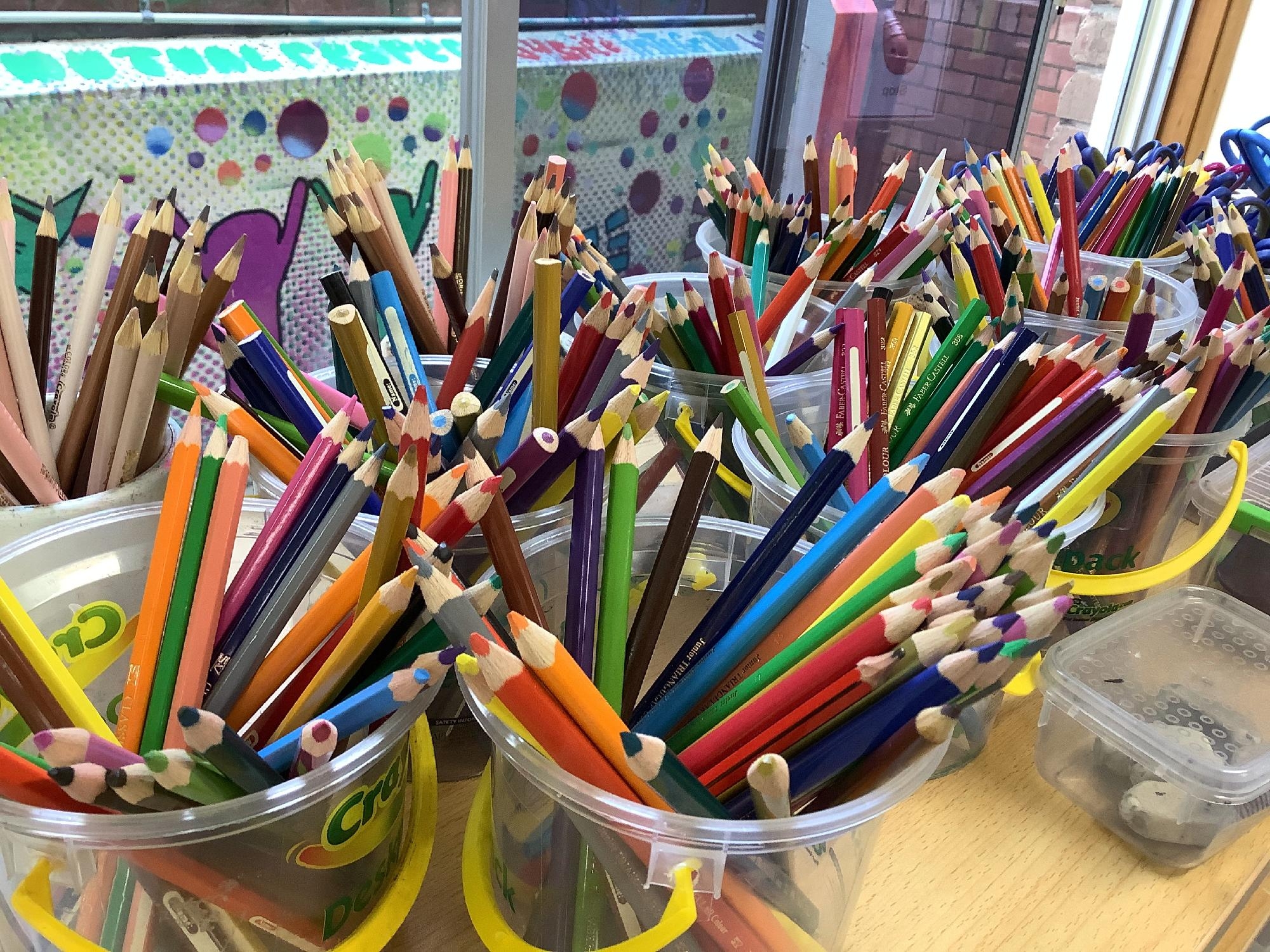 Buckets filled with coloured pencils ready for student use at Mercedes College.